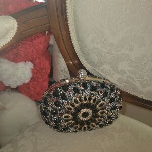 Elegant Black and Gold Embellished Clutch